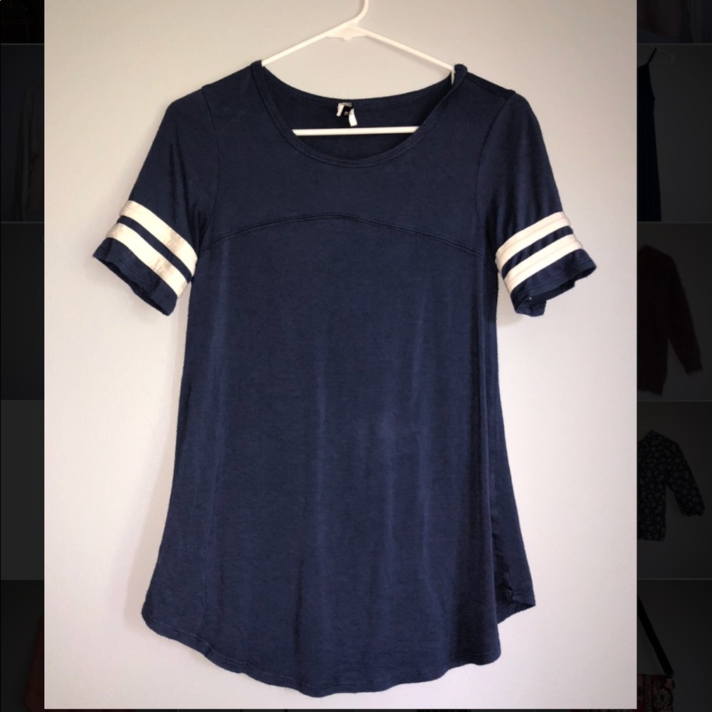 Dark blue t shirt with white strips on the arm!!